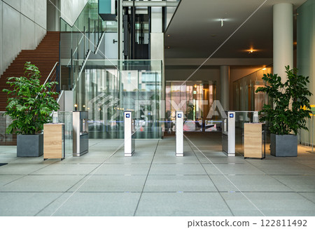 Office building entrance with security gate Office building entrance with security gate 122811492