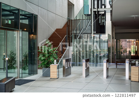 Office building entrance with security gate 122811497
