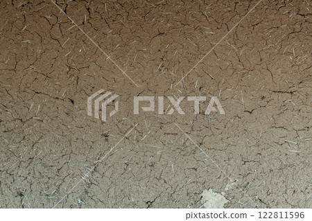 Earthen wall structure of an old house [Background material] 122811596