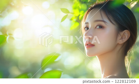 Beautiful woman in green light 122812109