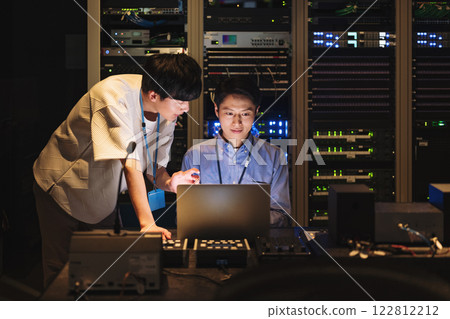 Server engineers discussing Server engineers discussing 122812212