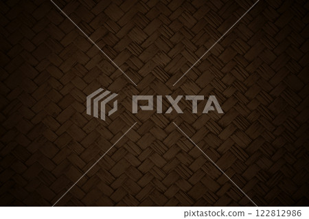 Dark brown bamboo weaving pattern, old woven rattan mat texture for background and design art work. 122812986