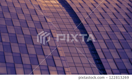 Curved Glass Facade with Modern Symmetry - A sleek architectural design featuring geometric panels and warm, tinted reflections. Ideal for showcasing design portfolios, architectural branding, or Curved Glass Facade with Modern Symmetry - A sleek architectural design featuring geometric panels and warm, tinted reflections. Ideal for showcasing design portfolios, architectural branding, or 122813269