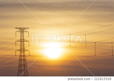 Sunset and electricity transmission tower Sunset and electricity transmission tower 122813520