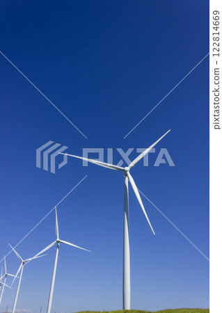 Wind power generator shining in the blue sky 122814669