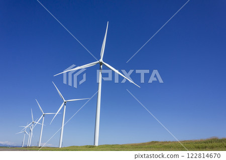 Wind power generator shining in the blue sky 122814670