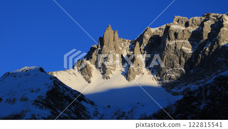 Winter sunset scene in Elm, Swiss Alps. 122815541