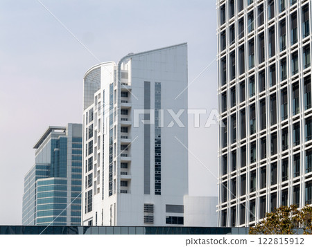 Modern office buildings urban cityscape architectural daylight wide angle contemporary design 122815912