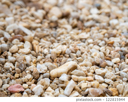 Gravel deposits in focus close-up textures of earthy ground-level environments 122815944