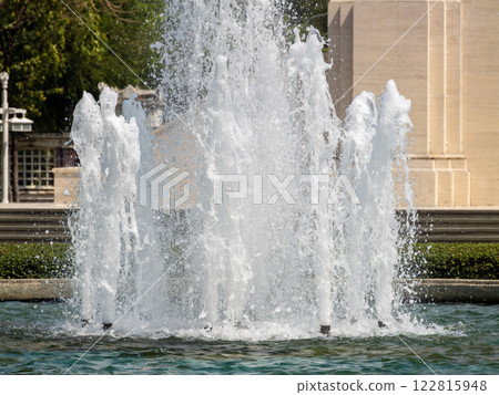 Elegant water fountain display urban park article outdoor close-up serenity and beauty Elegant water fountain display urban park article outdoor close-up serenity and beauty 122815948