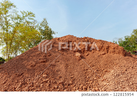 Excavation work a dirt mound construction site outdoor aerial view earthmoving process 122815954