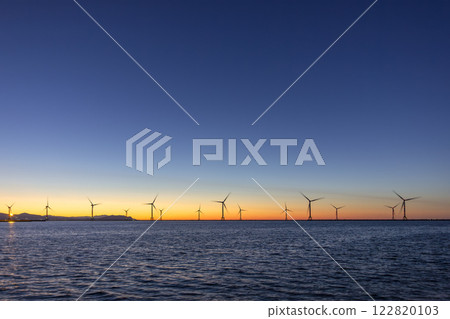 Hanawa Pier and offshore wind power tower at sunset 122820103