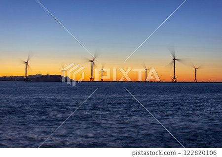 Hanawa Pier and offshore wind power tower at sunset 122820106