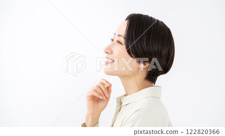Middle-aged woman, smiling, profile 122820366