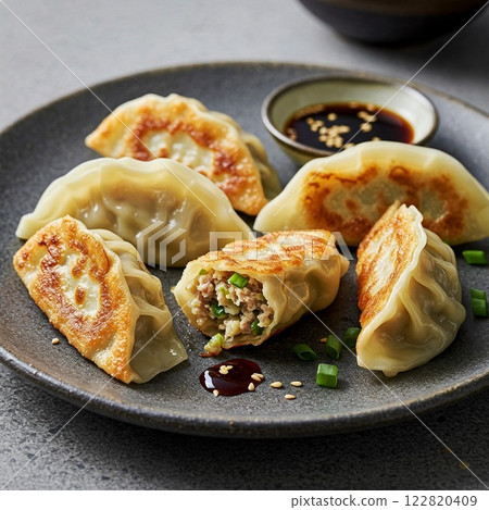 Dumplings and grilled fish Dumplings and grilled fish 122820409