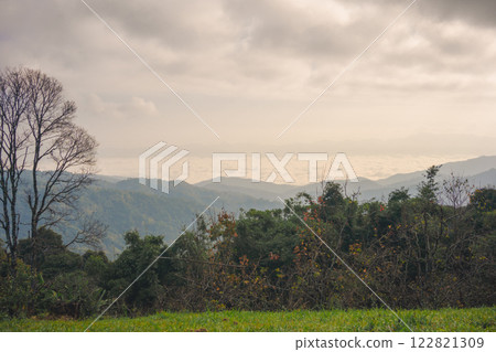 landscape and travel concept with sunrise and layer of mountain and mist with forest on morning landscape and travel concept with sunrise and layer of mountain and mist with forest on morning 122821309