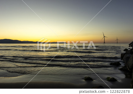 Ishikari Beach and wind power towers at dusk 122822878