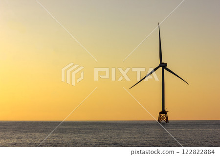 Ishikari Beach and wind power towers at dusk Ishikari Beach and wind power towers at dusk 122822884