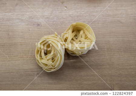 detailed view of raw fettuccine set detailed view of raw fettuccine set 122824397