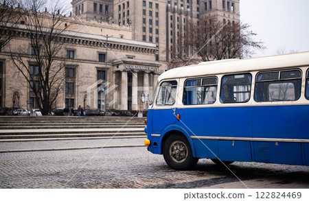 Historical Touristic Bus Over Warsaw Building Of Science And Culture, And Old Blue Bus For City Sightseeing 122824469