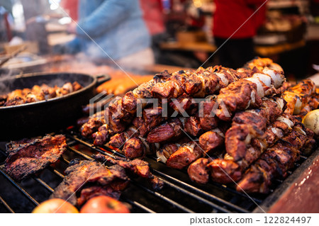 Grilled Skewered Meat At Street Food Market, Delicious Barbeque Meat In Open Air Restaurant 122824497