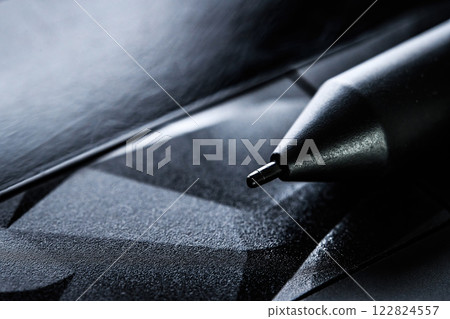 drawing pen on a tablet close up view 122824557