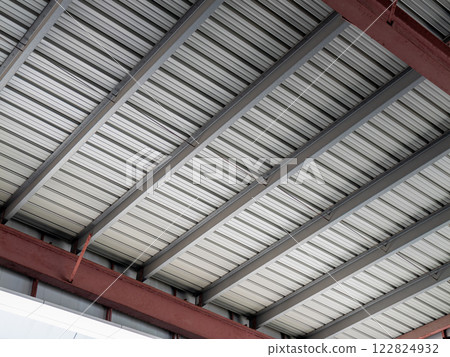 Industrial architecture steel beams under roof warehouse interior modern design high angle view 122824932