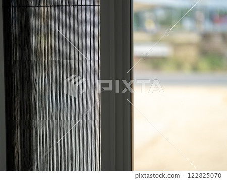 Window view of modern architecture with screen outdoor environment close-up perspective Window view of modern architecture with screen outdoor environment close-up perspective 122825070
