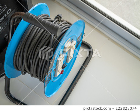 Electrical power reel installation techniques workshop guide indoor close-up safety practices 122825074