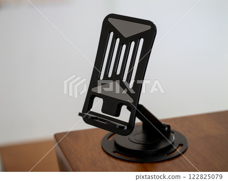 Close-up photography of innovative smartphone holder a functional home office essential 122825079