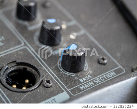Sound mixer controls adjustment studio environment equipment close-up professional setup Sound mixer controls adjustment studio environment equipment close-up professional setup 122825224