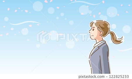 Profile of a woman in a suit standing among cherry blossoms dancing in the wind Profile of a woman in a suit standing among cherry blossoms dancing in the wind 122825233