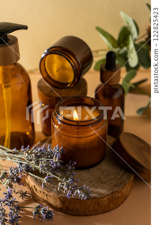 Soy candles in a glass jar. Aromatherapy. Burning candle and lavender. Soy candles in a glass jar. Aromatherapy. Burning candle and lavender. 122825423