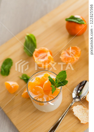 Seasonal citrus dessert with mint Seasonal citrus dessert with mint 122825566