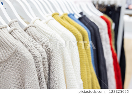 Apparel store clothes on display 122825635
