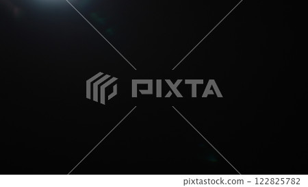 Real optic lens flare over black background for overlay or background Real optic lens flare over black background for overlay or background 122825782