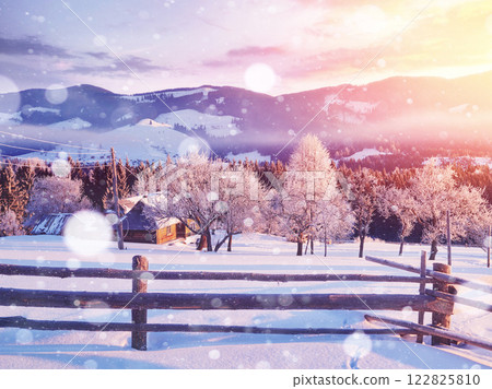 Amazing mountains in the morning sunlight. Small cozy village. Carpathian, Ukraine, Europe. Beauty world. Happy New Year Amazing mountains in the morning sunlight. Small cozy village. Carpathian, Ukraine, Europe. Beauty world. Happy New Year 122825810