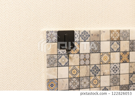 Close up shot of the decorative tiles on the kitchen Close up shot of the decorative tiles on the kitchen 122826053