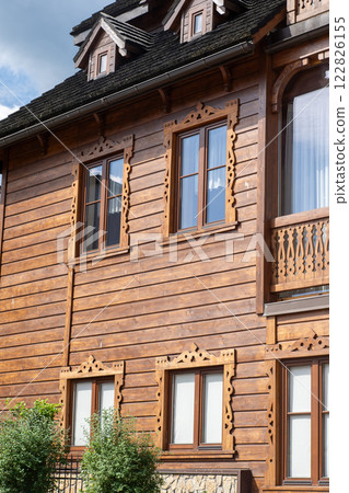Old wooden house. Exterior facade. 122826155