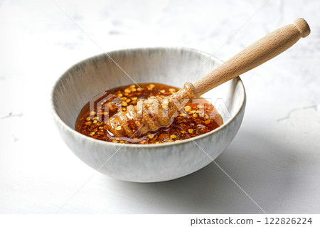 hot honey sauce 122826224