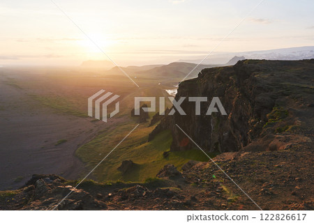 Colorful sunset over the mountains. Fantastic views of the landscape in Iceland. Beauty world Colorful sunset over the mountains. Fantastic views of the landscape in Iceland. Beauty world 122826617