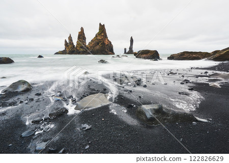 The Rock Troll Toes. Reynisdrangar cliffs. Black sand beach. Iceland 122826629
