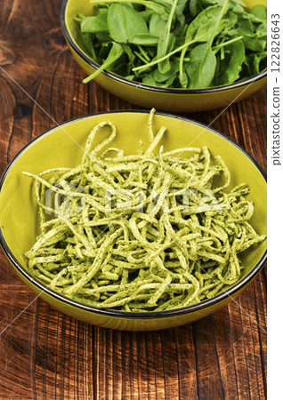 Tasty pasta with spinach. 122826643