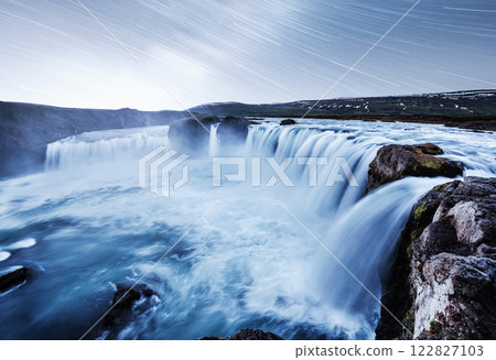 Hodafoss very beautiful Icelandic waterfall. It is located in the north near Lake Myvatn and the Ring Road. Fantastic starry sky with moving stars 122827103