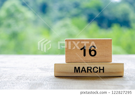 16 March calendar on wooden table with customizable space for text, ideas or messages. Calendar and copy space concept 122827295