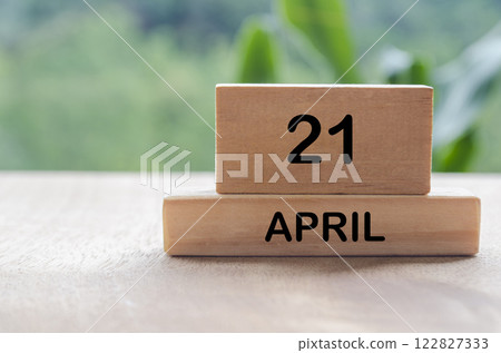 21 April calendar on wooden table with customizable space for text, ideas or messages. Calendar and copy space concep.t 122827333