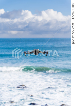 Drone flying on the shore 122828108