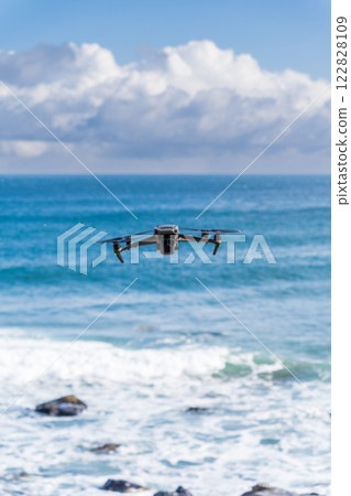 Drone flying on the shore 122828109