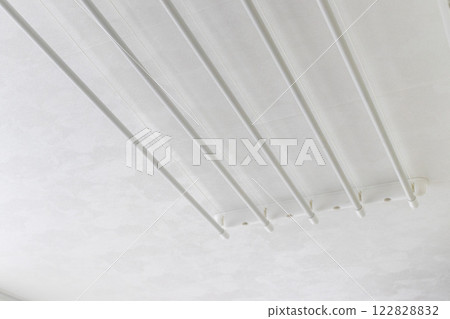 String from the cloth dryer fixture on the wall 122828832