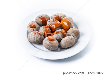 Papas arrugadas with mojo isolated on white background. Traditional Canary Islands food. 122829077